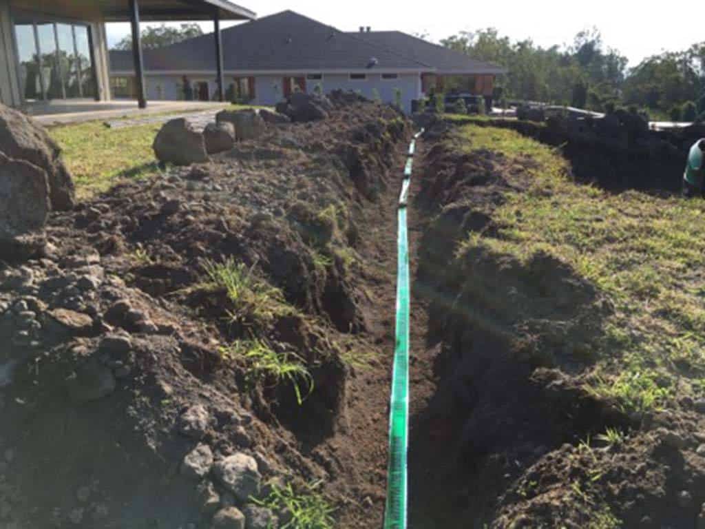 Trench excavated for irrigation installation near Kailua-Kona.