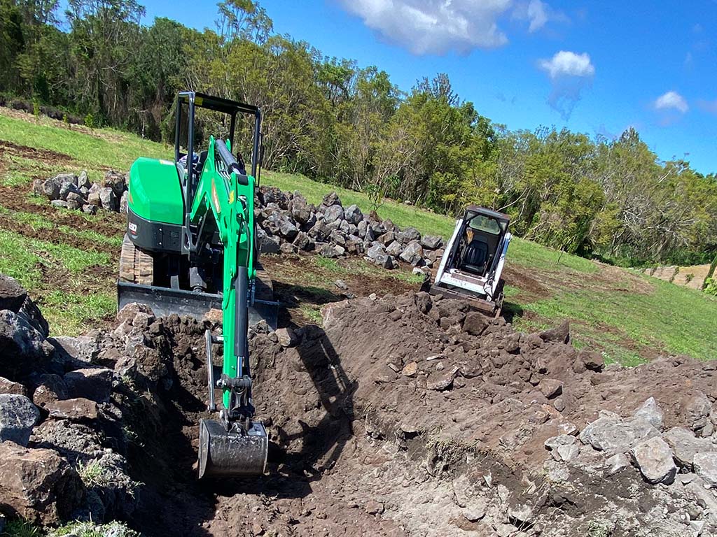 Hawaii pool installation service being performed by the best landscaping company, Kona.